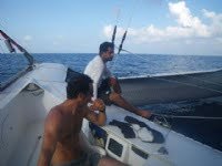 musandam-in-the-doldrums Thierry and Mohsin wait for wind (Photo Courtesy of Oman Sail)