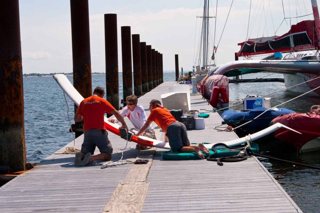Groupama 3 Crew Doing Maintenance At Gateway Marina  (Photo by George Bekris)