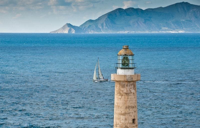 sailing-past-faviganana-by-kurt-arrigo Sailing Past Faviganana (Photo by Rolex/Kurt Arrigo)