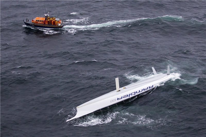 Rambler 100 Capsizes by Carlo Borlenghi Rambler 100 Capsizes In The Rolex Fastnet Race (Photo by Rolex / Carlo Borlenghi )