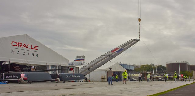 Crane lifting boat for launch (Photo by James Avery)