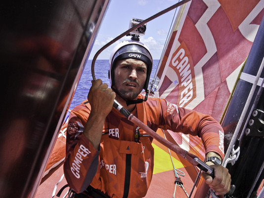 Mike Pammenter getting set to go up for a rig check CAMPER with Emirates Team New Zealand during leg 1 of the Volvo Ocean Race 2011-12, from Alicante, Spain to Cape Town, South Africa. (Credit: Hamish Hooper/CAMPER ETNZ/Volvo Ocean Race) 