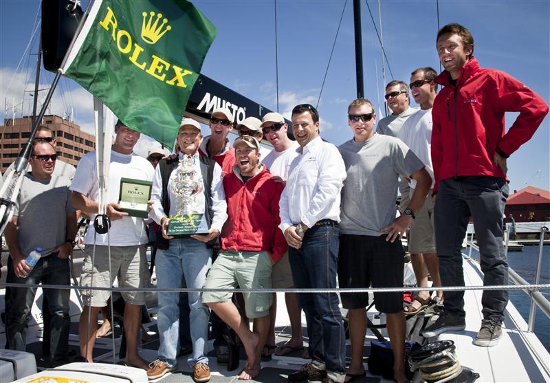 Stephen Ainsworth owner of LOKI with his crew and Patrick Boutellier Rolex Australia (Photo by Rolex /  Daniel Forster)