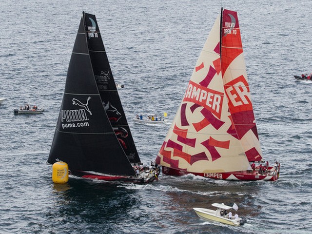 PUMA Ocean Racing powered by BERG, skippered by Ken Read from the USA chases down CAMPER with Emirates Team New Zealand, skippered by Chris Nicholson from Australia, to take third place in the PORTMIAMI In-Port Race, during the Volvo Ocean Race 2011-12. (Photo by  IAN ROMAN/Volvo Ocean Race)