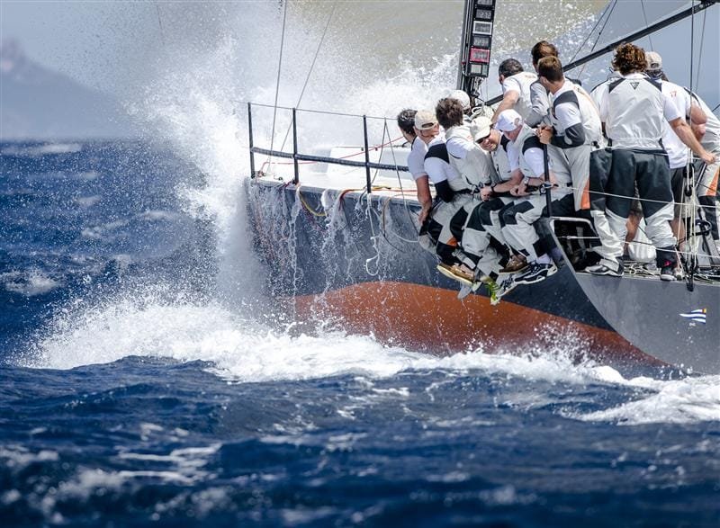 NEAR MISS (SUI) in a challenging downwind leg by Kurt Arrigo NEAR MISS (SUI) in a challenging downwind leg (Photo by Rolex / Kurt Arrigo)