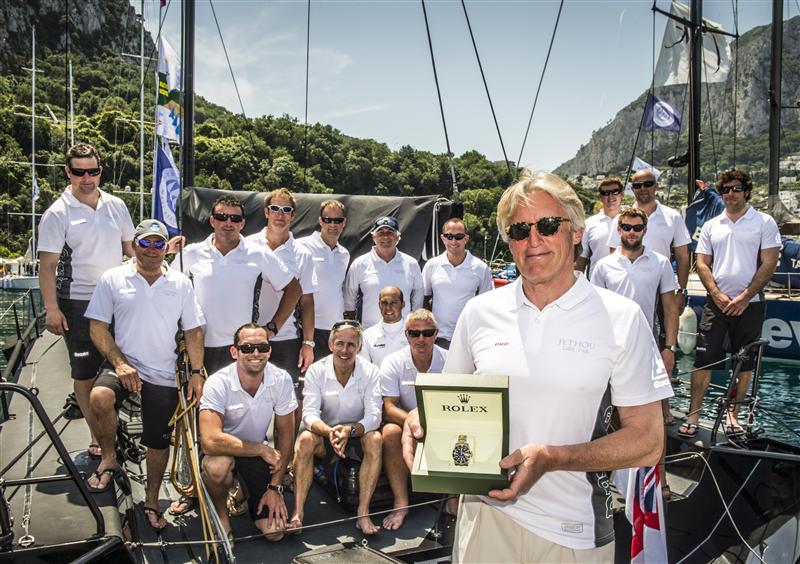 Sir. Peter Ogden, owner of JETHOU (GBR) receives a Rolex timepiece for his overall win at the Rolex Volcano Race (Photo by Rolex / Kurt Arrigo)